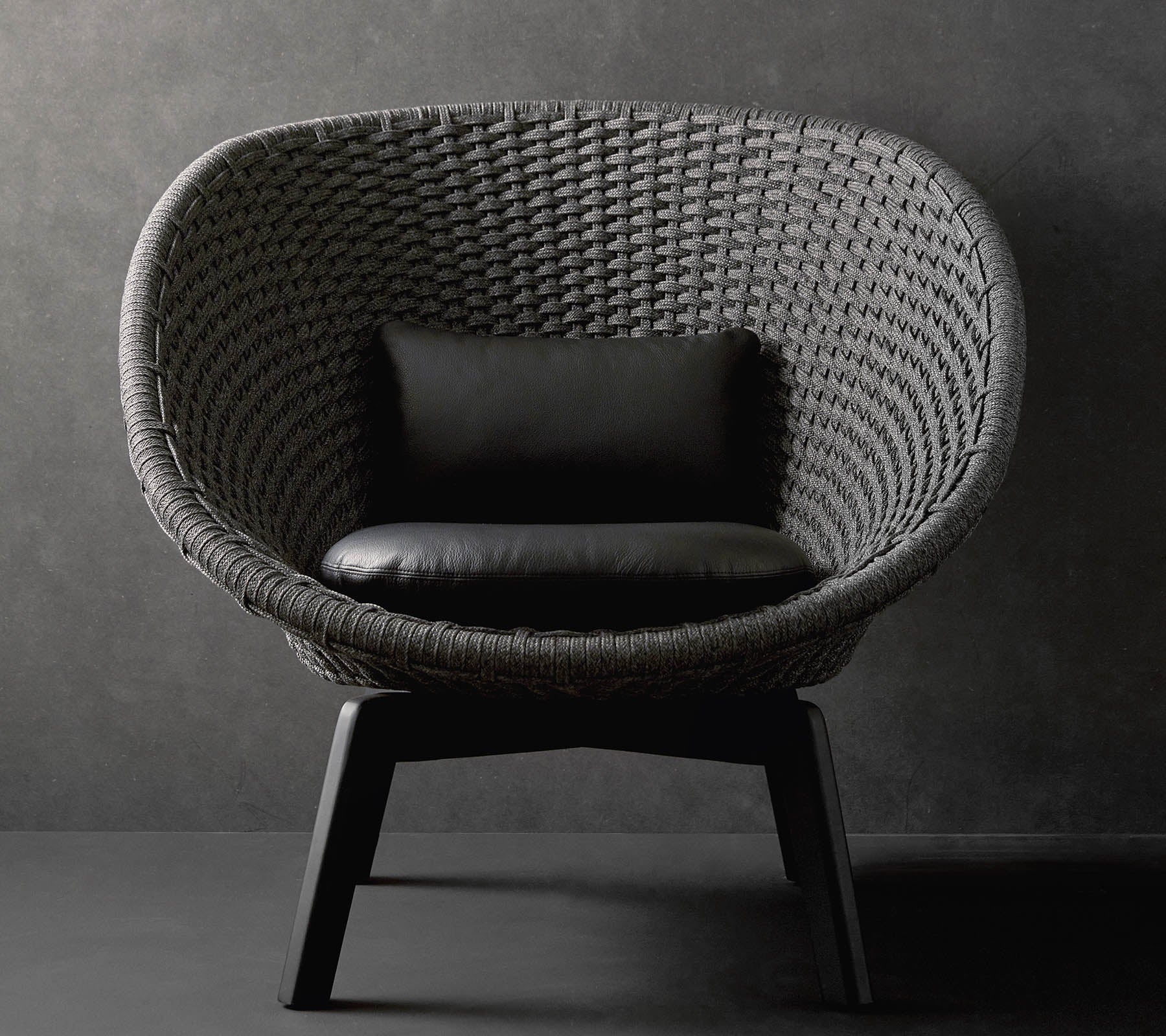 Cane-line Peacock Lounge Chair with Black Teak Legs Indoor
