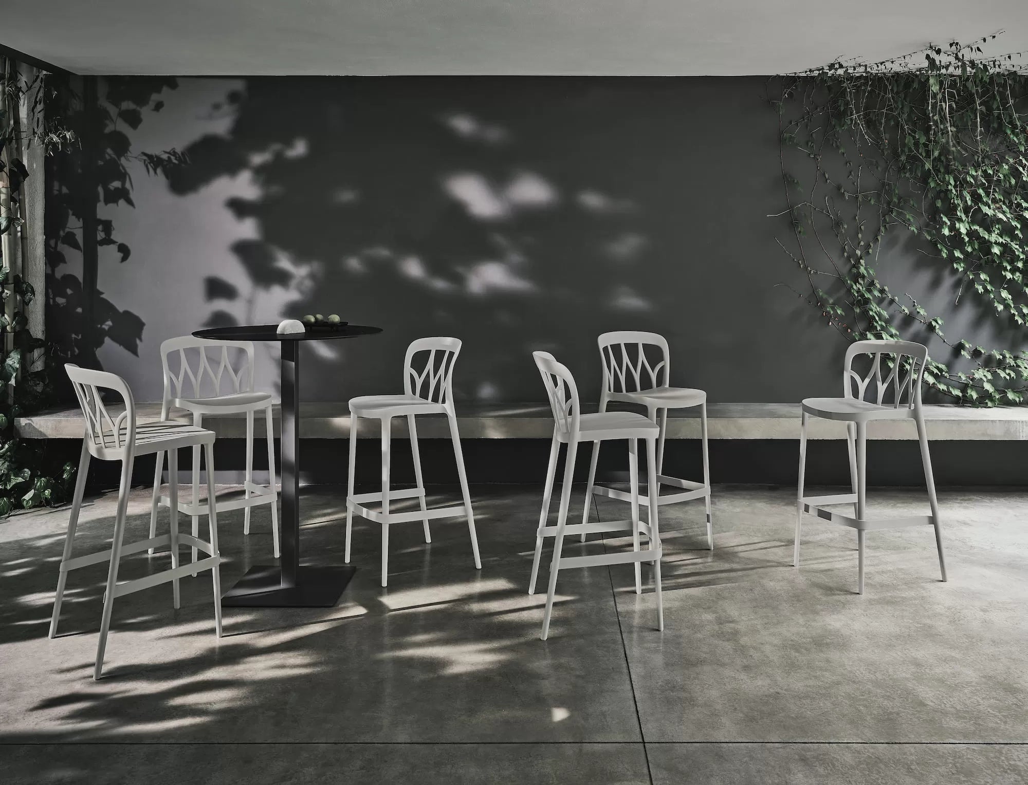 Galaxy Footstool High stacking barstool in polypropylene and recyclable glass fibre