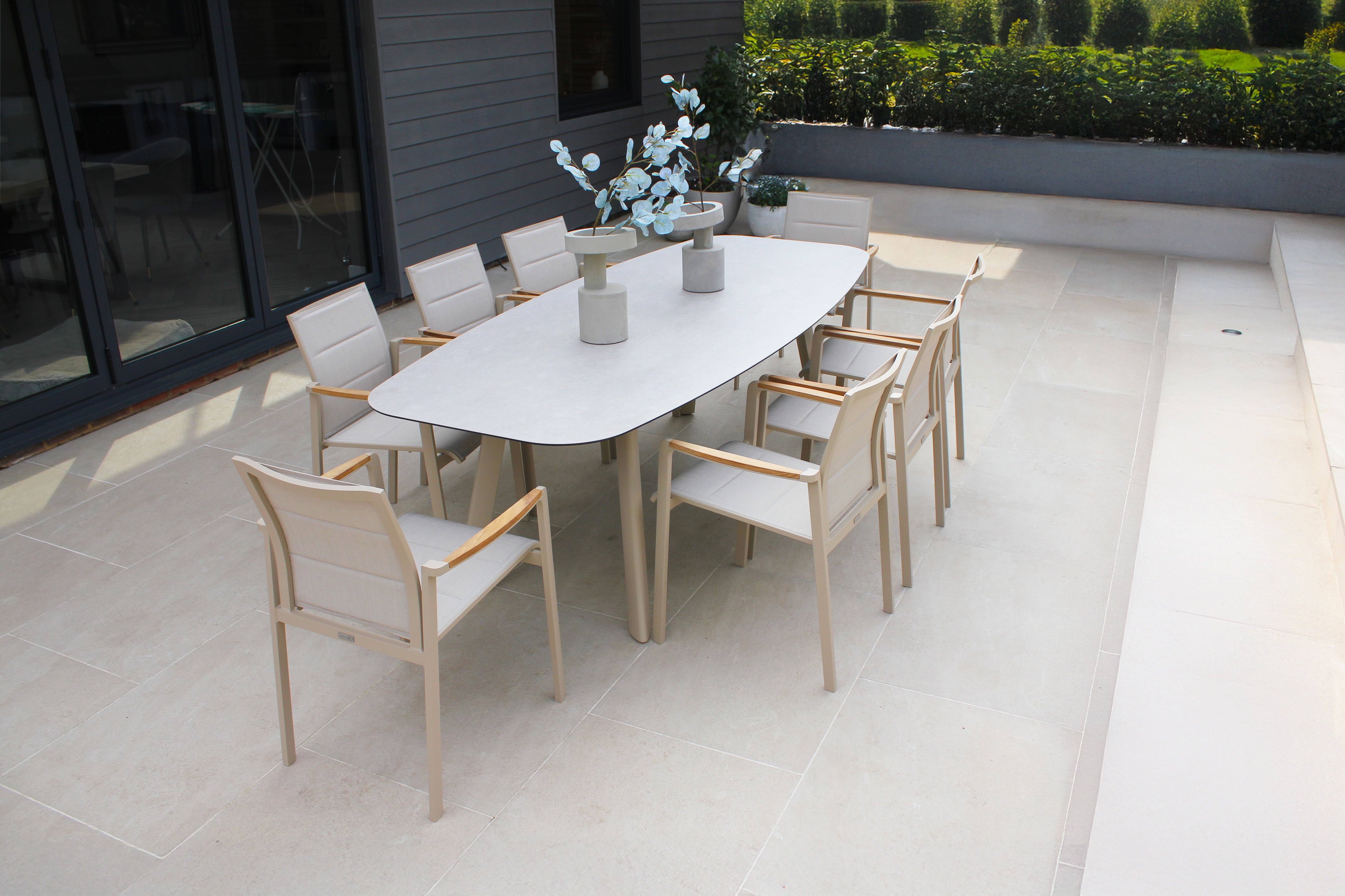4 Seasons Outdoor Cortina 8 Seat with Manolo 240cm Barrel Ceramic Dining Table