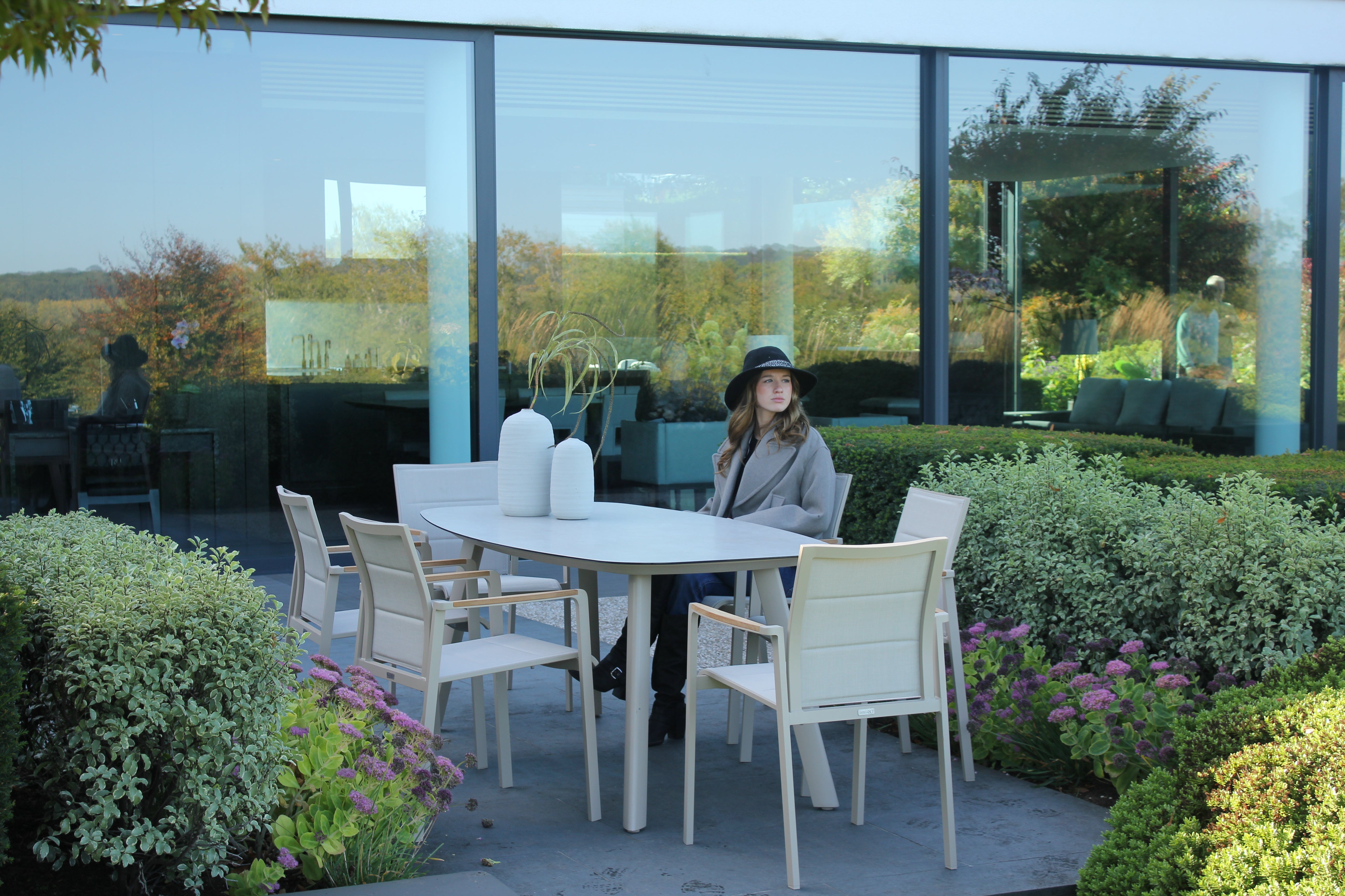 4 Seasons Outdoor Cortina 6 Seat with Manolo 180 cm Barrel Ceramic Dining Table