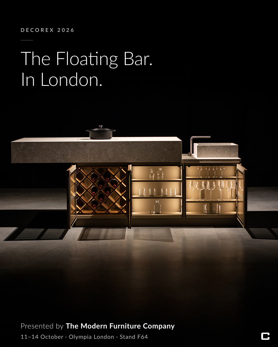 Smaller CUBIC Floating Bar presented at Decorex 2026 with wine rack, illuminated glassware storage and sliding worktop