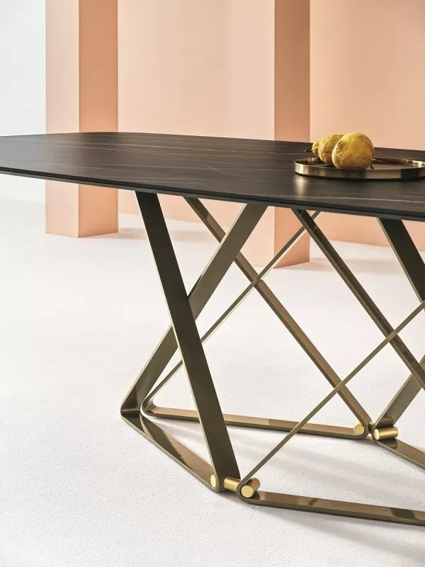 Delta Fixed rectangular table with lacquered metal frame and decorative details