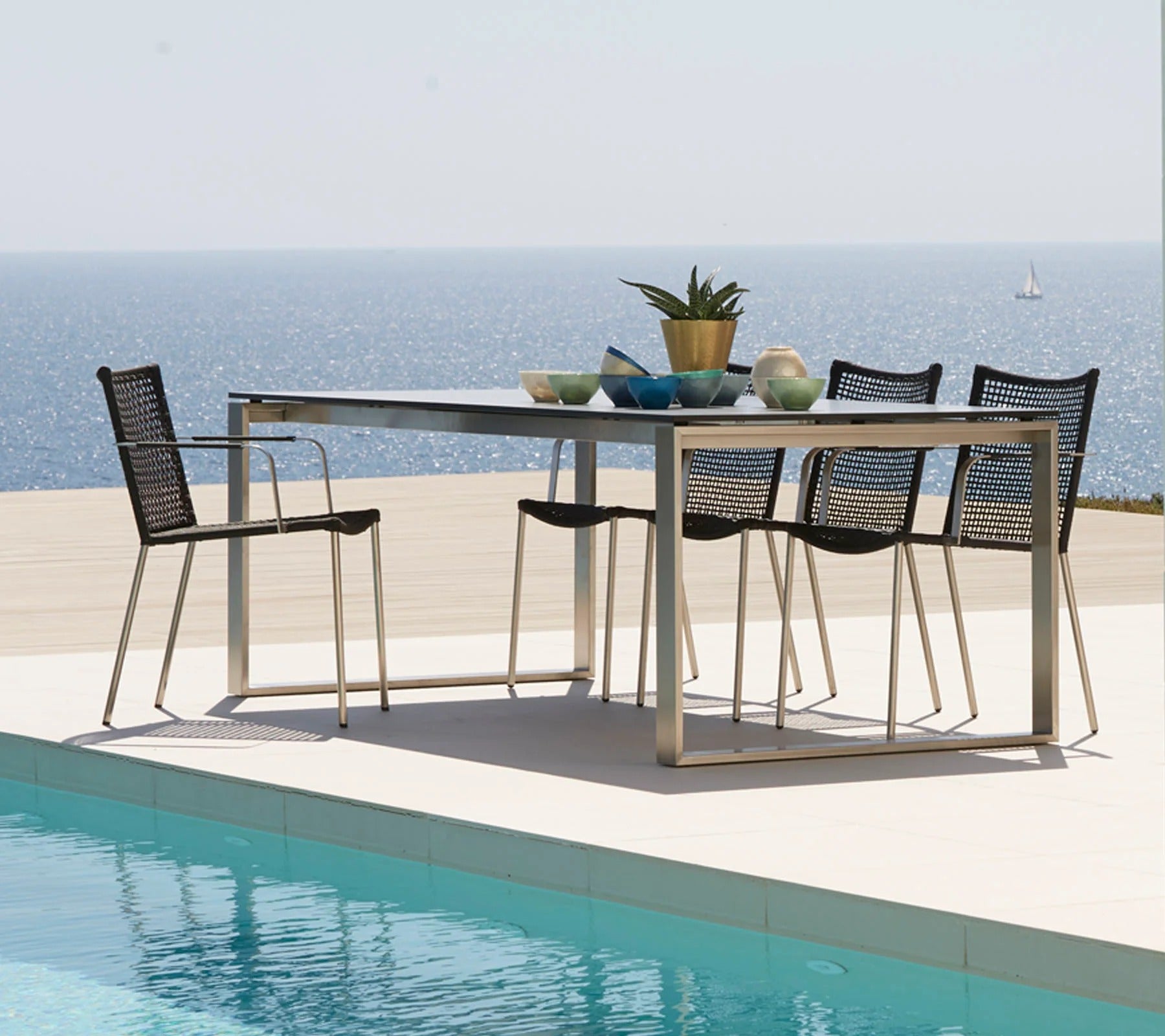 Cane-line Straw Armchair Stackable